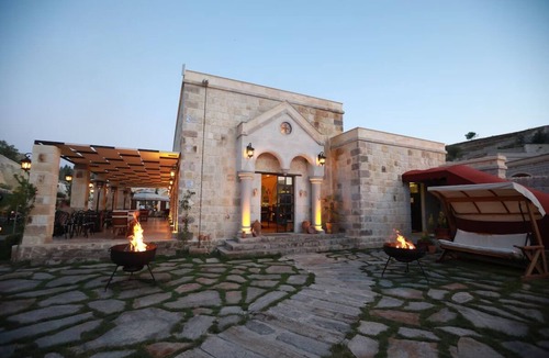 Mustafapasa Hotel | Romantic Cave Getaway with Hammam Access & Elegant Garden Dining!