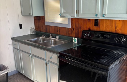 Chetek Cottage | Romantic cottage+Boating with dock, + ATV trails + Fishing+ .5 mile to downtown!