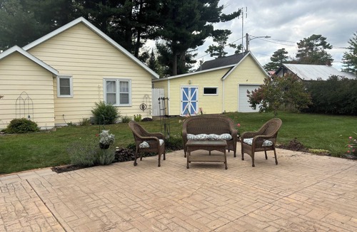 Chetek Cottage | Romantic cottage+Boating with dock, + ATV trails + Fishing+ .5 mile to downtown!