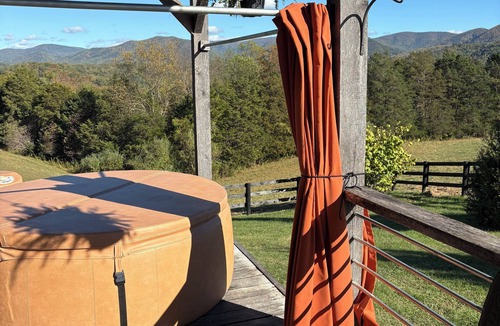 Glasgow Cabin | Romantic Couples Getaway | Rustic Post & Beam Cabin with Mountain Views Escape to this immaculate post-and-beam cabin nestled on 42 peaceful acres of rolling pasture and cedar forest — perfect for a romantic retreat!