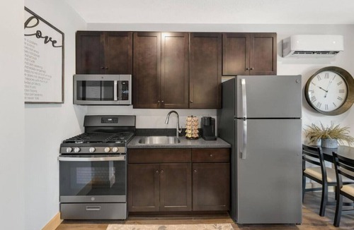 Berlin Apartment | Romantic Getaway with Private Patio and Hot Tub on Main Street - Maple Suite