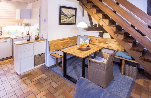 Dimbach House | Romantic holiday home with a large sun terrace and fireplace