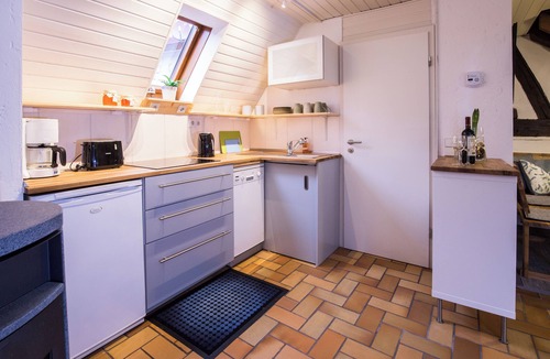 Dimbach House | Romantic holiday home with a large sun terrace and fireplace