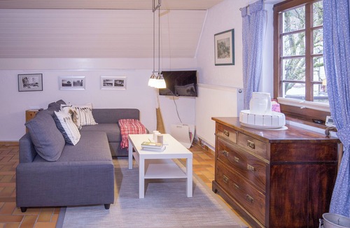 Dimbach House | Romantic holiday home with a large sun terrace and fireplace