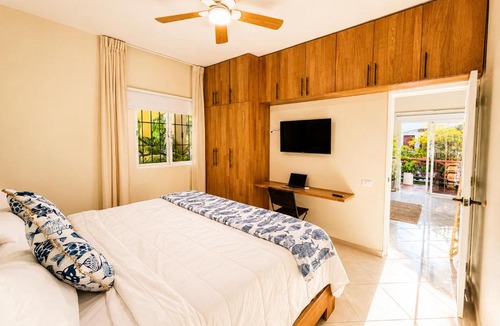 El Centro Apartment | Romantic Oasis Las Terrenas King Bed and Pool View