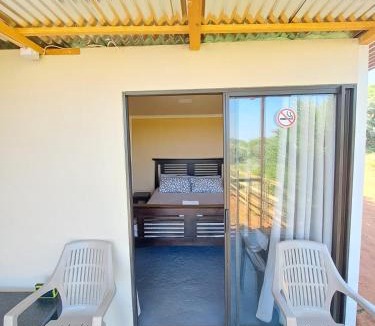 Madibeng Apartment | Romantic Private Bush Chalet at Game Farm Retreat near Hartbeespoort