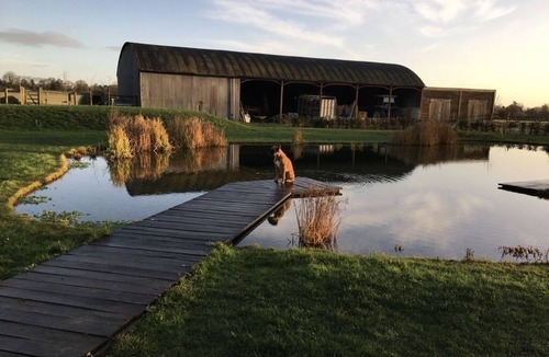 Witney Apartment | Romantic, quirky farm loft conversion with beautiful natural swimming pool