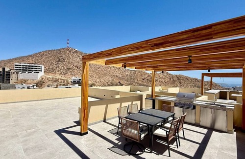Libertad Apartment | Rooftop BBQ, Pool Access, Gym & Sunset Views