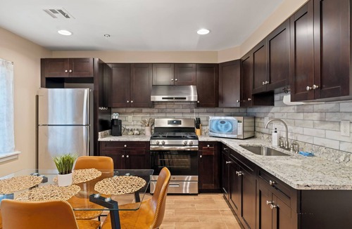 Market East Apartment | Rooftop Deck Chinatown Getaway w/Shared Gamroom