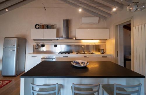 Conegliano Apartment | Rooftop nest