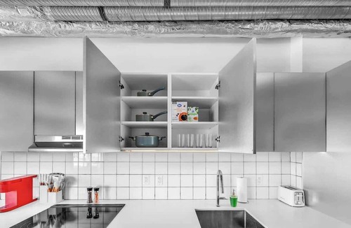 East Village Apartment | Rooftop Oasis w/River Views & Sauna Access