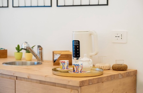 Copertino Apartment | Room 'Celine Dimora e Suite - Alida' with Shared Garden, Wi-Fi and Air Conditioning