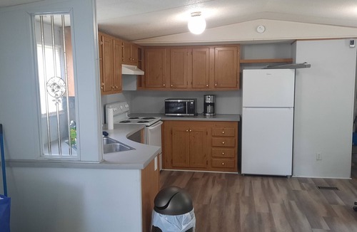 Stanton House | Room in mobile home with WiFi, AC, free washer & dryer. 5 miles from Blue Oval
