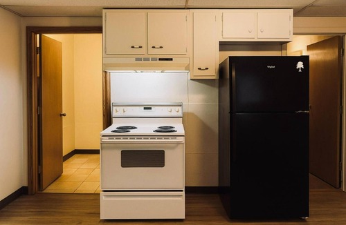 Wolf Point Hotel | Room w/Kitchen Designed for Budget Road Travelers Looking for a Restful Stop