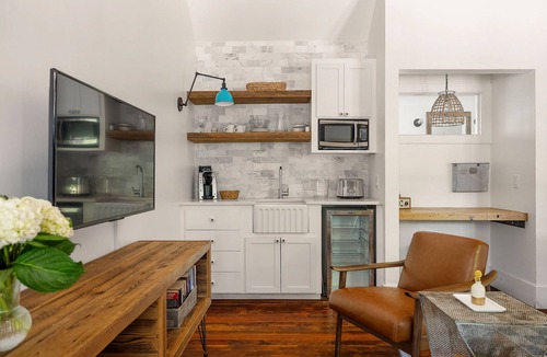 Comfort Cabin | Room with One King Bed and Shared Patio