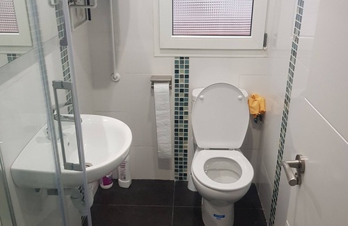 Castro Urdiales Condo | Round shared room