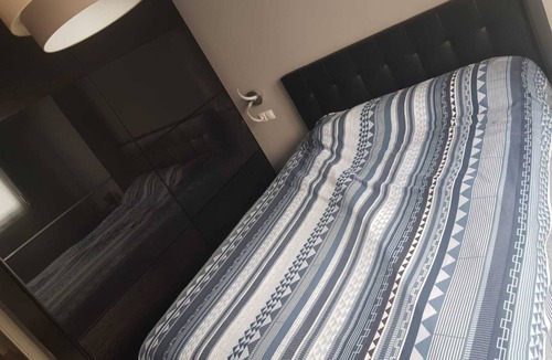 Castro Urdiales Condo | Round shared room