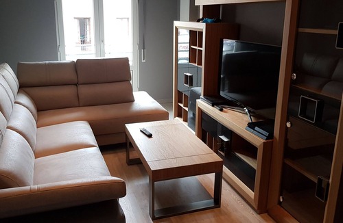 Castro Urdiales Condo | Round shared room