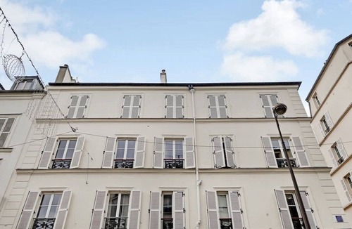 Montmartre Apartment | Rue Lepic - quintessential winding cobblestone street- Take a step into the past