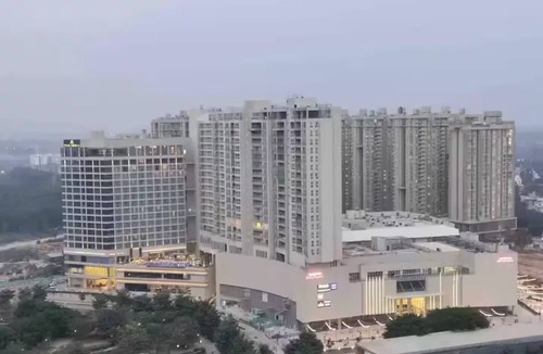 Bengaluru Apartment | Rustic 2BR in Bharatiya City