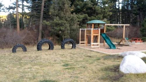 Granite County House | Rustic Conestoga Wagon Stay with Lodge Amenities near Boulder Creek, Montana