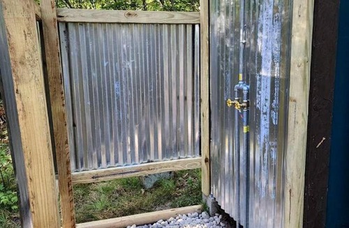 Bitely House | Rustic Converted School Bus with Outdoor Shower Near ORV Trails in Manistee National Forest, Michigan