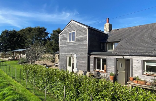 Portloe Cottage | Rustic cottage close to the coast with sea views. Dog friendly, large garden.