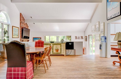 Amagansett North House | Rustic, Eclectic-style home with private pool, flooding natural light,...