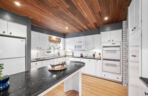 St. Charles Historic District House | Rustic Handcrafted Japanese-Style Home by OldTown, Three Bedrooms, Theater Room