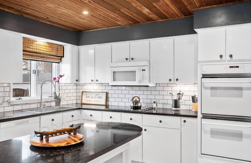 St. Charles Historic District House | Rustic Handcrafted Japanese-Style Home by OldTown, Three Bedrooms, Theater Room