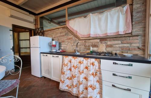 Montecastello House | Rustic holiday home in Pontedera with shared pool