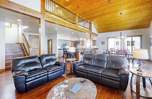 Pagosa Springs House | Rustic lakefront getaway with mountain views - dock, hot tub, fireplace & W/D