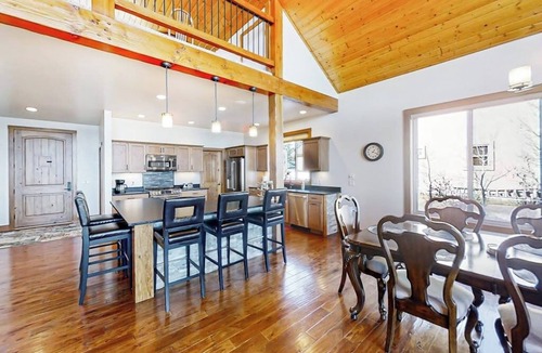 Pagosa Springs House | Rustic lakefront getaway with mountain views - dock, hot tub, fireplace & W/D