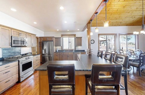 Pagosa Springs House | Rustic lakefront getaway with mountain views - dock, hot tub, fireplace & W/D