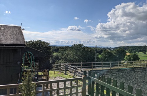 Harmer Hill Cottage | Rustic Log Cabin - Dog Friendly - Sleeps 2 - Views