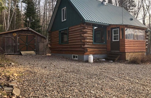 Mandeville Cabin | Rustic log cabin near ATV trails, skidoo, fishing and waterfalls!