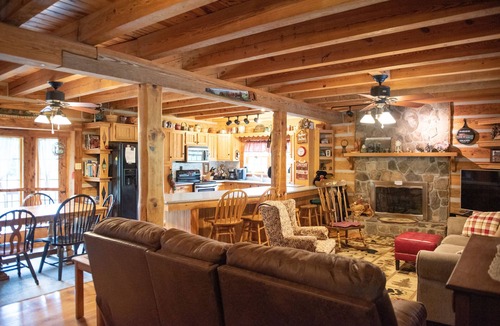 Luray Cabin | Rustic Log Lodge Overlooking Water and Mountain Views
