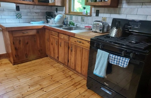 Millboro Springs Cabin | Rustic mountain retreat in beautiful Millboro - enjoy the solitude of the woods.