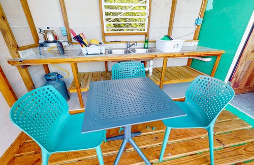 Sittee Point Apartment | Rustic oceanfront cabin w/overwater kitchenette, sea views & private deck