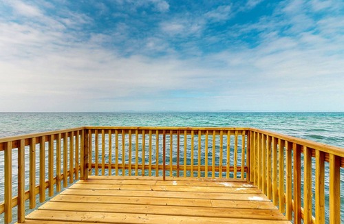 Sittee Point Apartment | Rustic oceanfront cabin w/overwater kitchenette, sea views & private deck