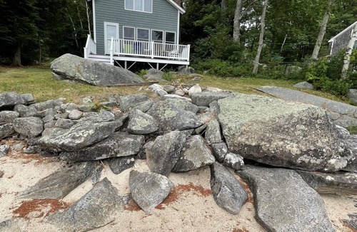 Standish Cottage | Rustic shorefront cottage with a small sandy beach