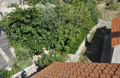 Lustica House | Rustic stone house with roof terrace and courtyard f. 4-6 people