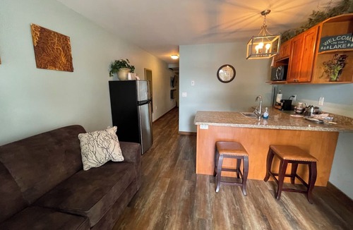 Solon Springs Apartment | Rustic Suite on the Lake: Cozy Comfort with Unmatched Sunrises.