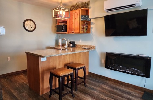 Solon Springs Apartment | Rustic Suite on the Lake: Cozy Comfort with Unmatched Sunrises.