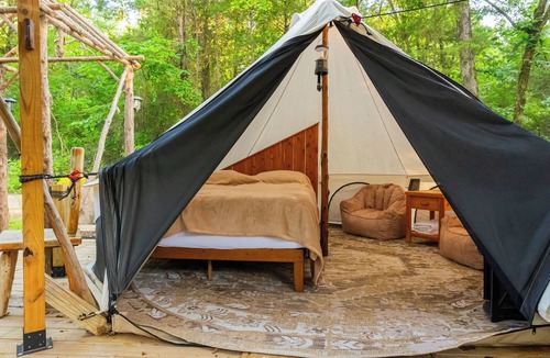 Honey Grove Apartment | Rustic Tent with shared Full Bath