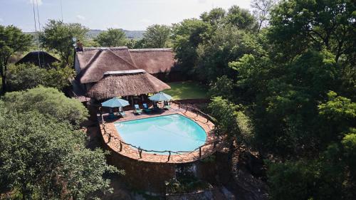 Madibeng Cabin | Sable Ranch Thaba Khaya Lodge