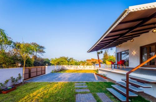 Anjaneri Villa | SaffronStays Blue Jasmine - twin 2BR pet-friendly villas with plunge pool, gardens & birdwatching near Sula Vineyard