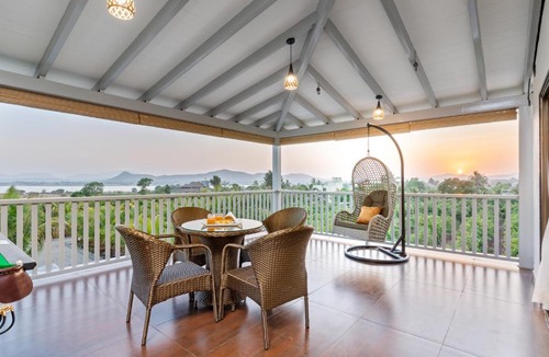 Nashik Villa | SaffronStays Mango Lakeview Villa - 3BR pool villa amid mango farms with Gangapur Dam views, deck & games