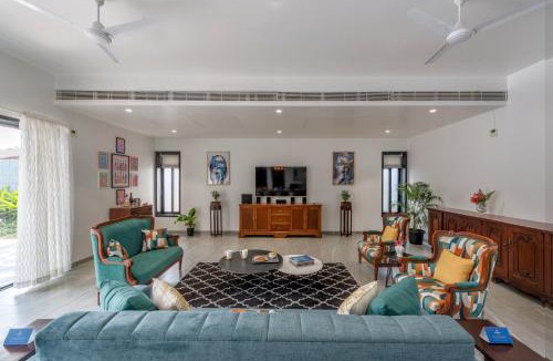 Alibaug Villa | SaffronStays Mayfair Gardens - 4BR pet-friendly pool villa with patio, den, board games & modern interiors near jetty