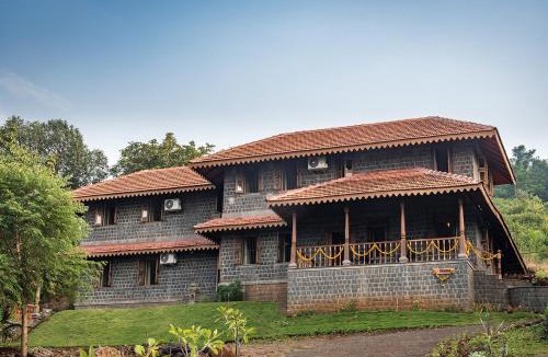Ambavna Villa | SaffronStays Niramay - 3BR Velhe villa, infinity pool, organic farm, library, valley & forest views near Torna-Rajgad